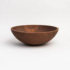Legacy Bowl in Walnut on a white background at Addison West