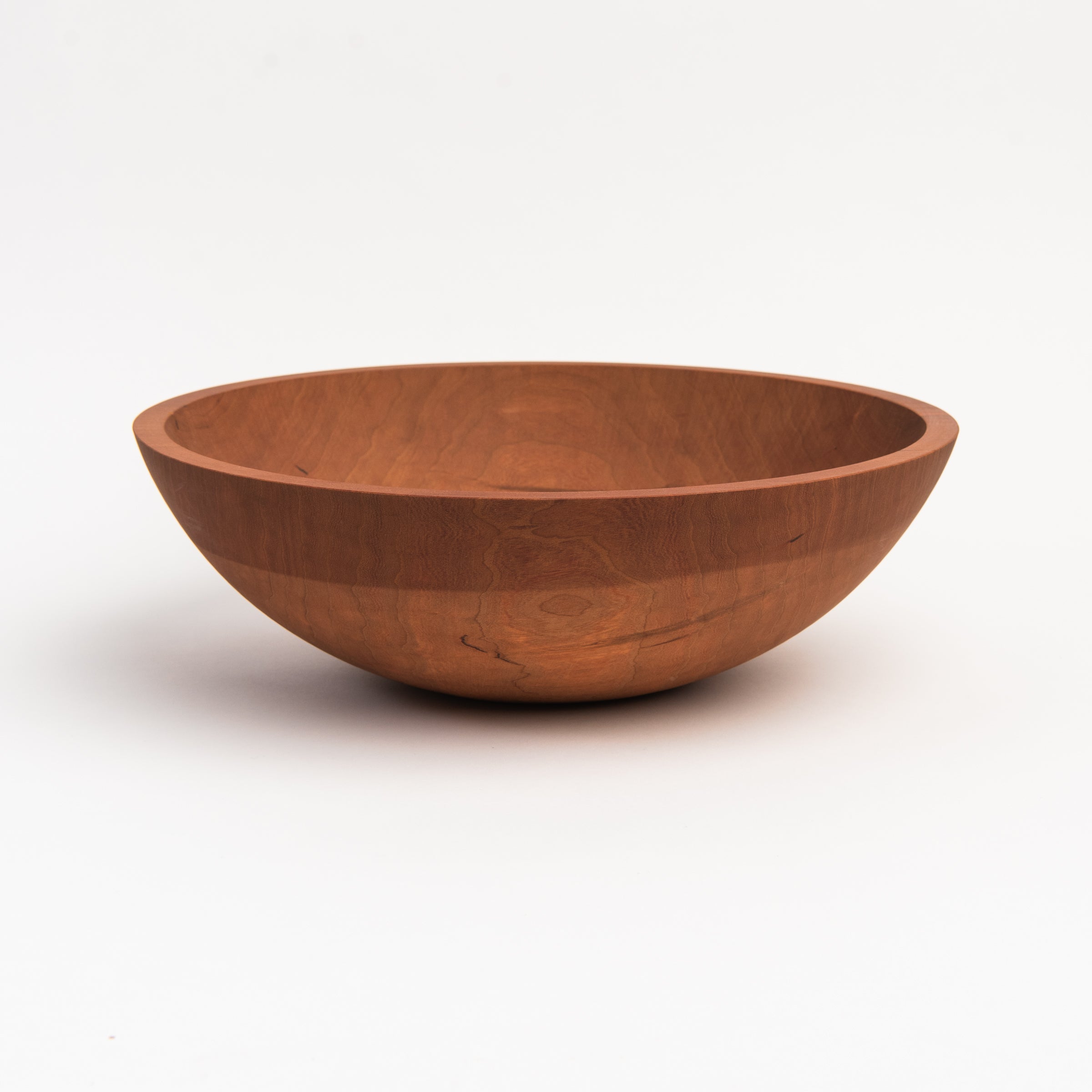 Legacy Bowl in Cherry on a white background at Addison West