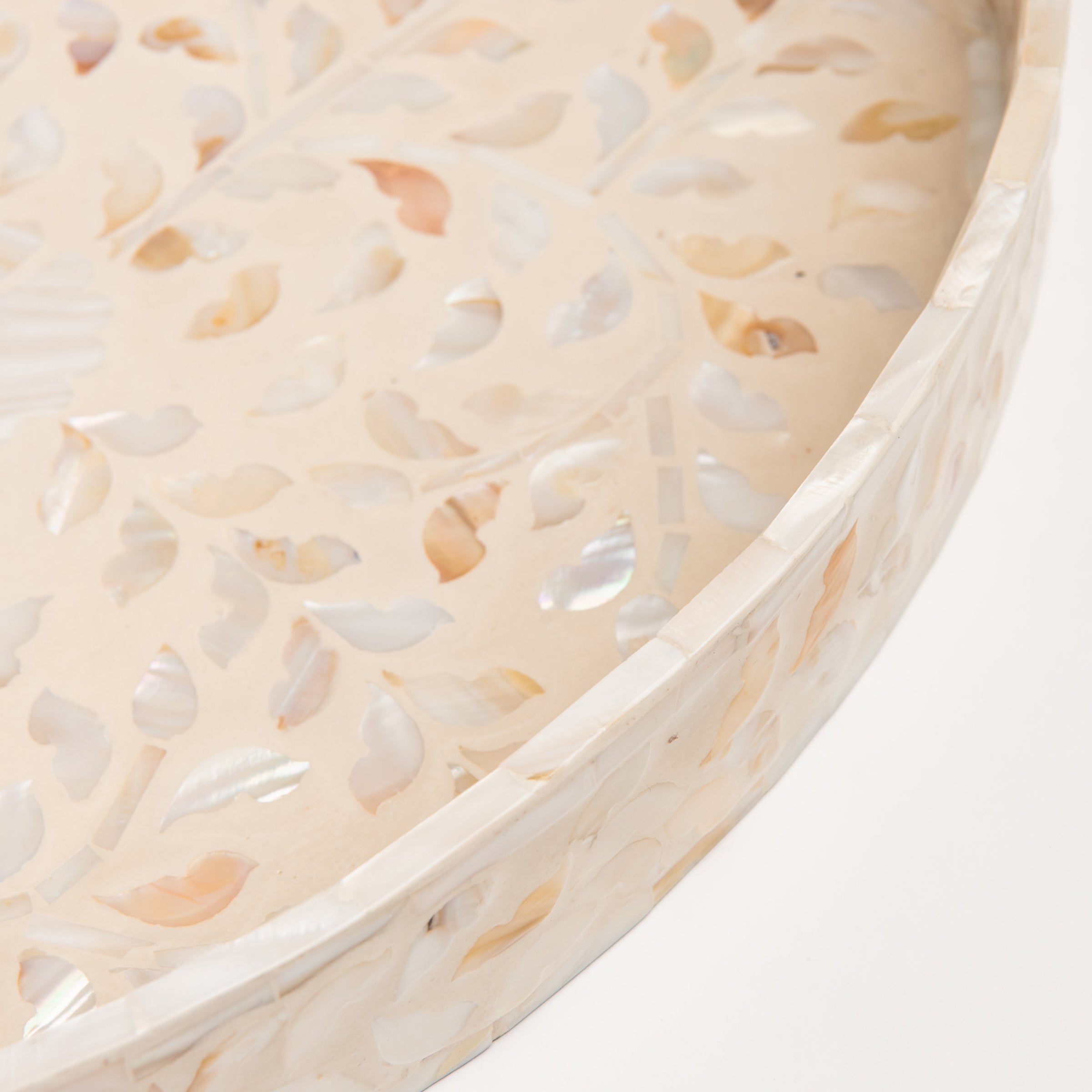 Close up of Small Mother of Pearl Oval Tray on a white background at Addison West
