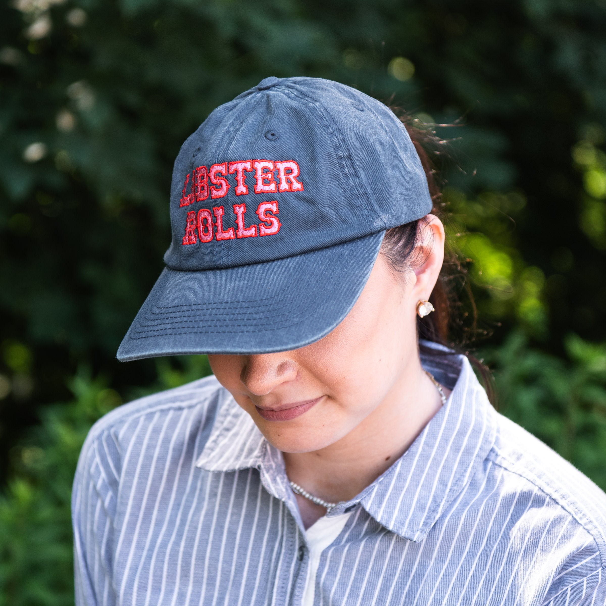 Lobster Roll Baseball Hat on a model at Addison West