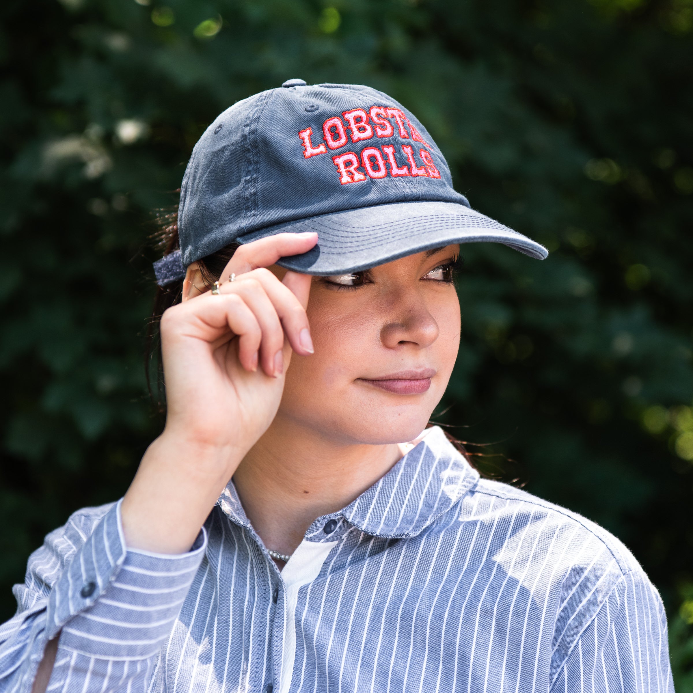 Lobster Roll Baseball Hat on a model at Addison West