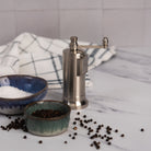 Alexander Chrome Chefs' Mate Pepper Grinder on a kitchen counter at Addison West