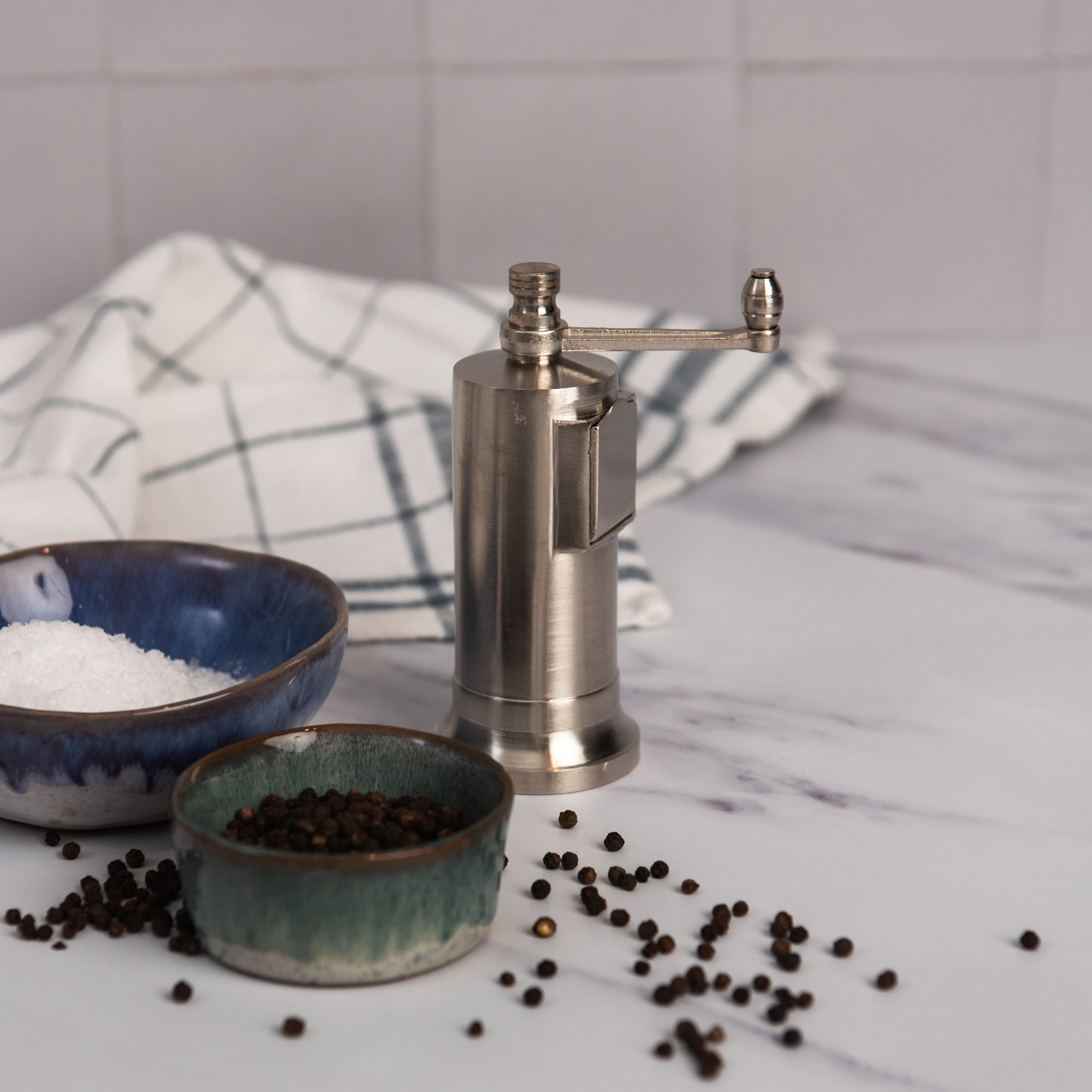 Alexander Chrome Chefs' Mate Pepper Grinder on a kitchen counter at Addison West