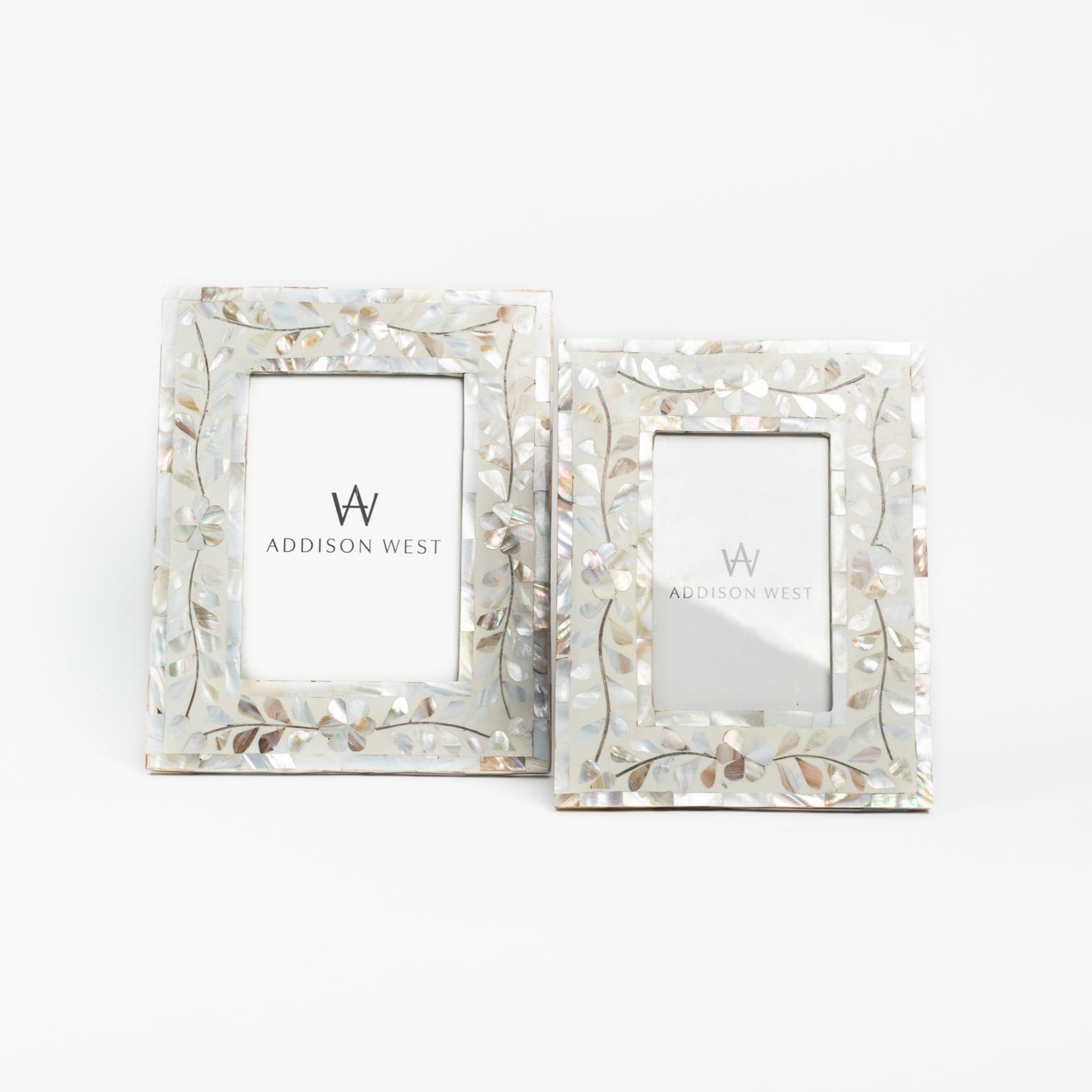 Mother of pearl picture frames on a white background