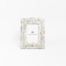 Mother of pearl picture frame on a white background