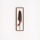 Feather pen on a white background at Addison West