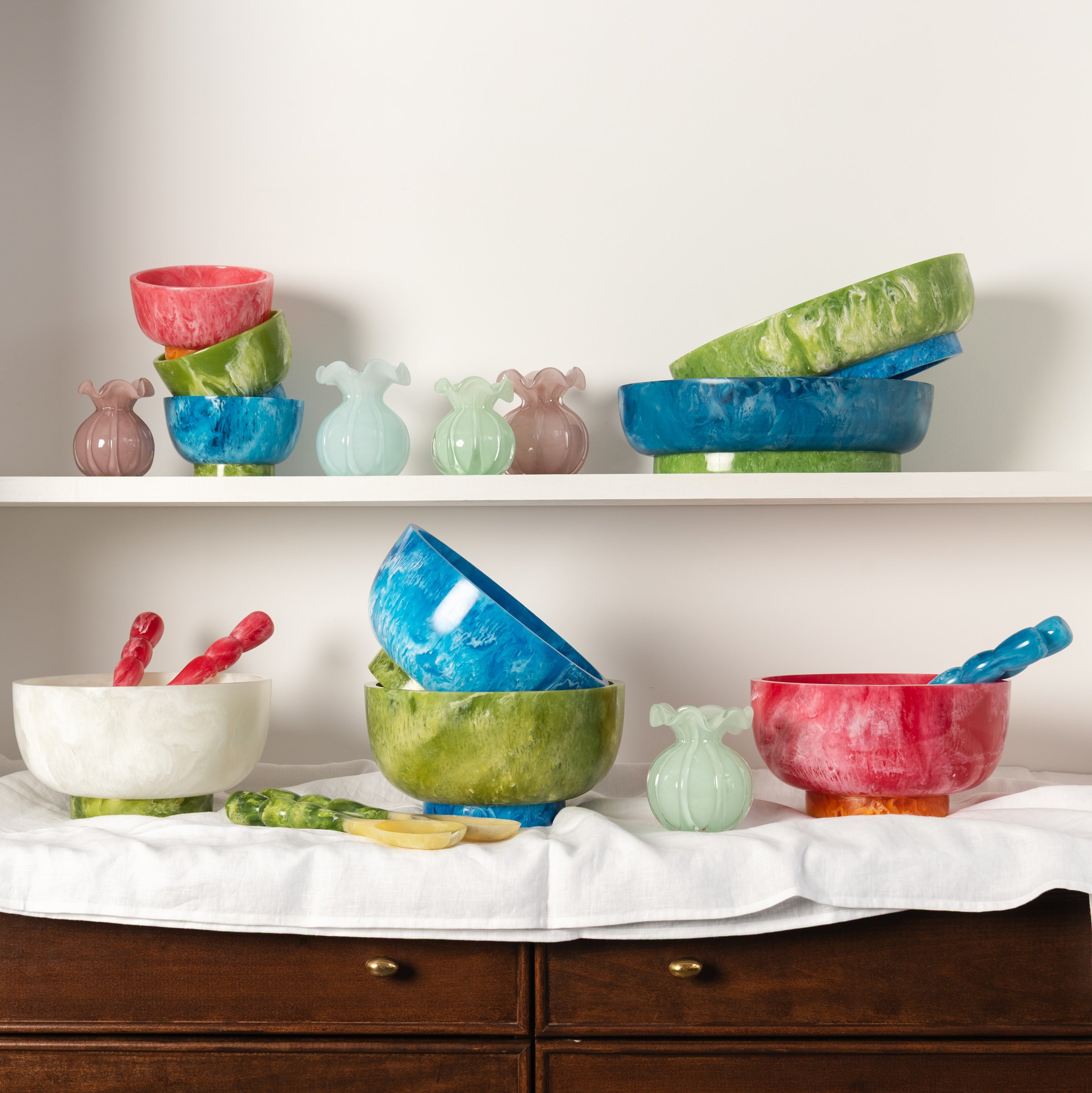Collection of Beatriz Ball RESIN and glass vases on shelves at Addison West