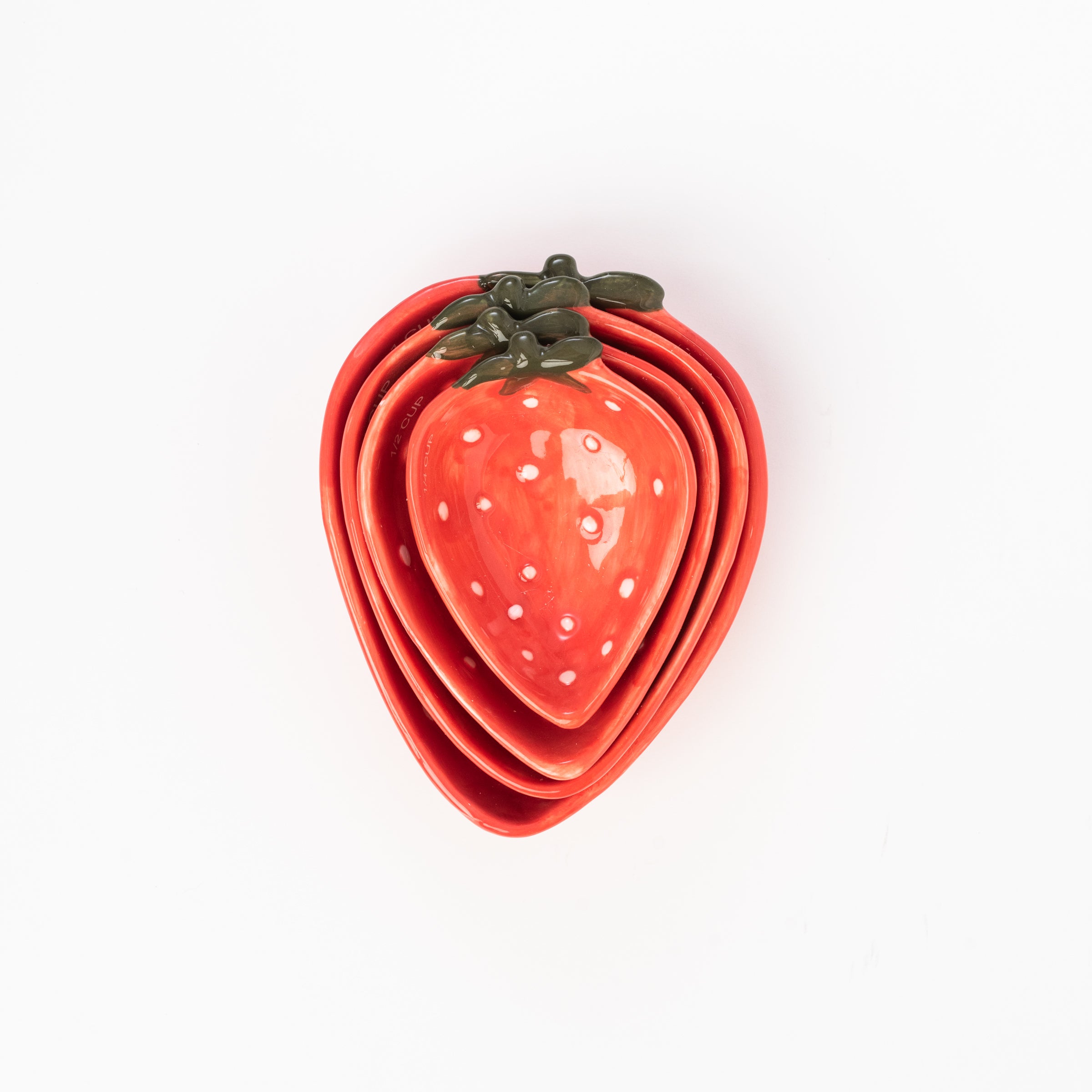Strawberry Stacking Measuring Cups on a white background at Addison West