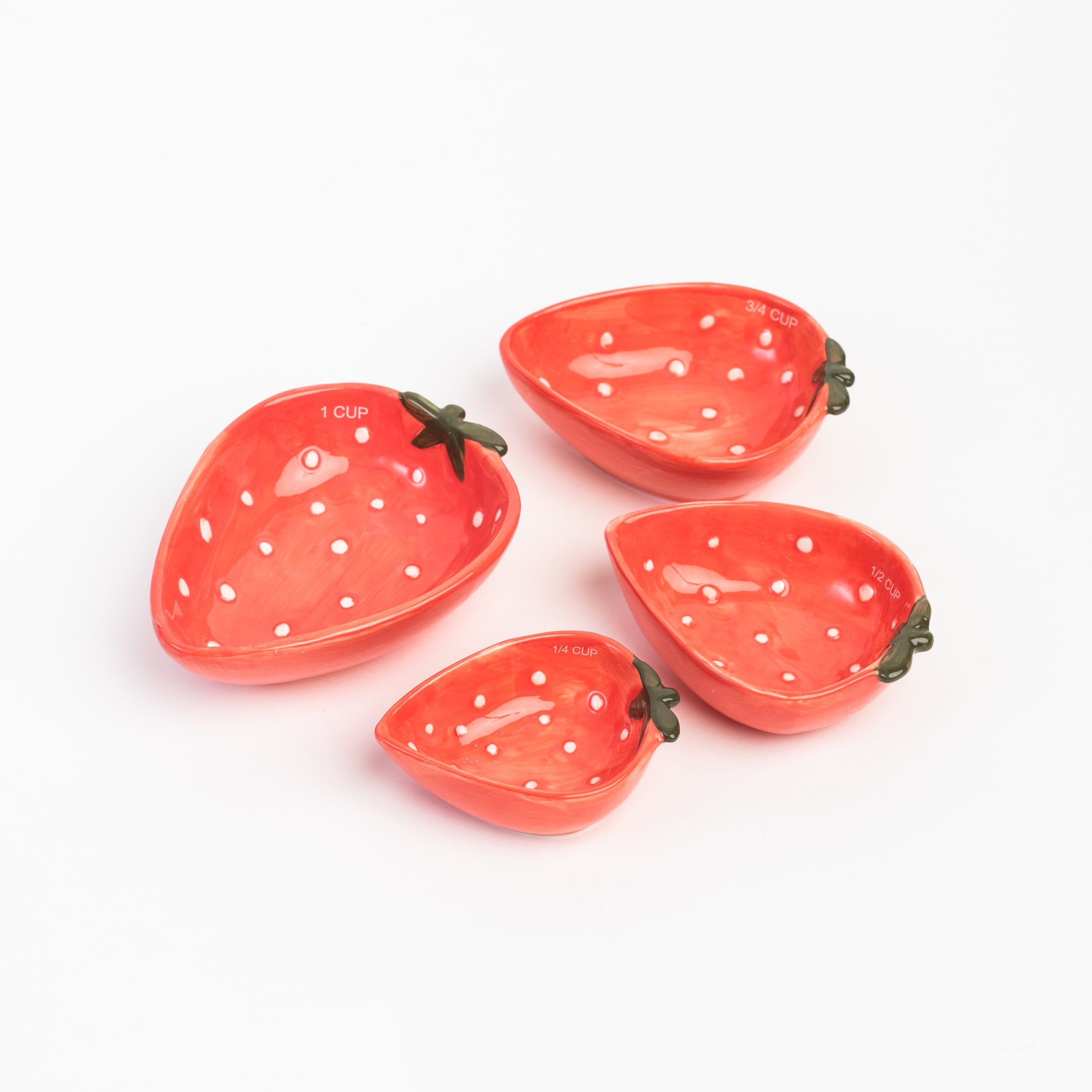 Strawberry Stacking Measuring Cups on a white background at Addison West