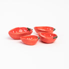 Strawberry Stacking Measuring Cups on a white background at Addison West