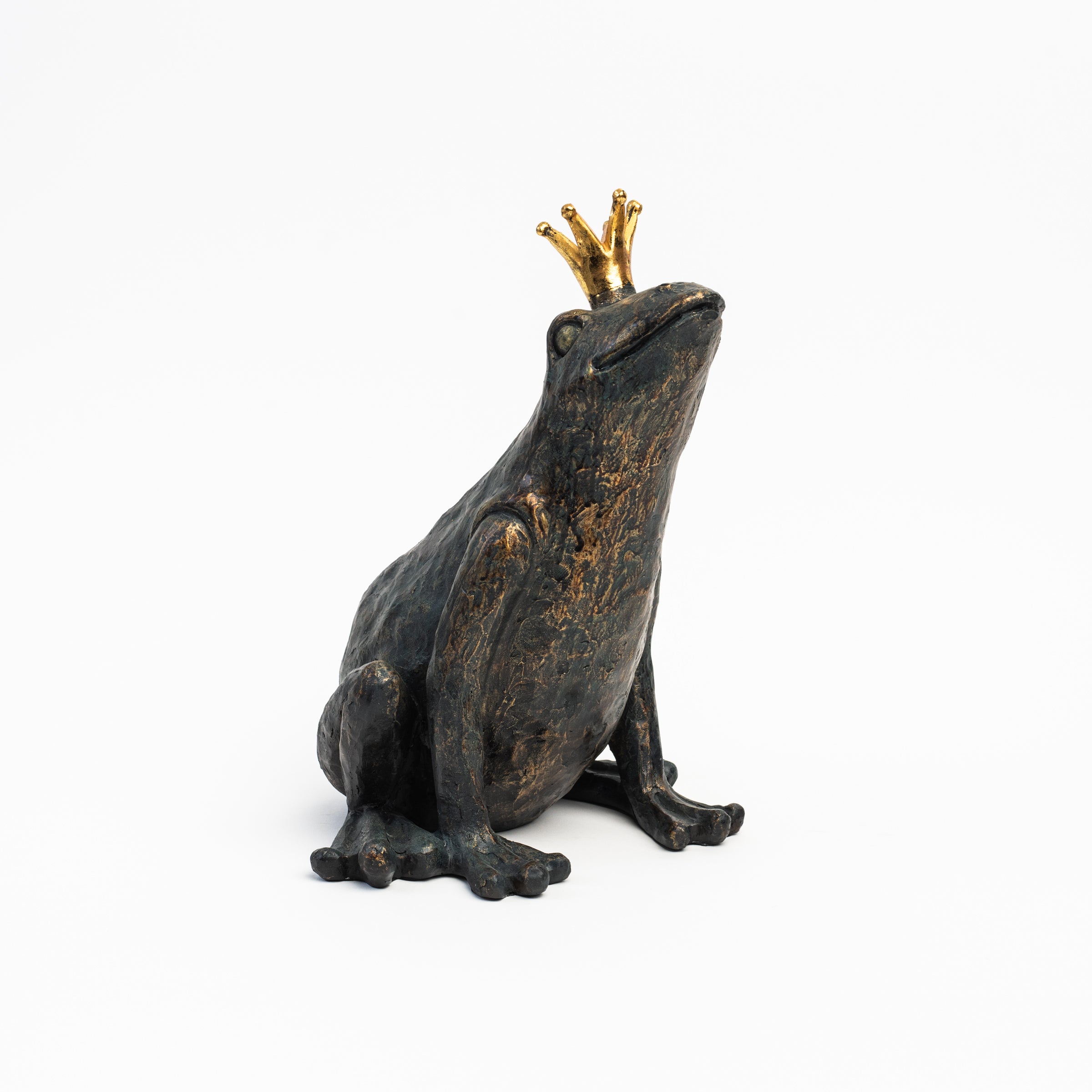 Patinaed Frog Prince on a white background at Addison West