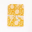 Meadow Block Print Throw Blanket on a white background at Addison West
