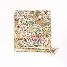 Secret Garden Quilted Throw Blanket on a white background at Addison West