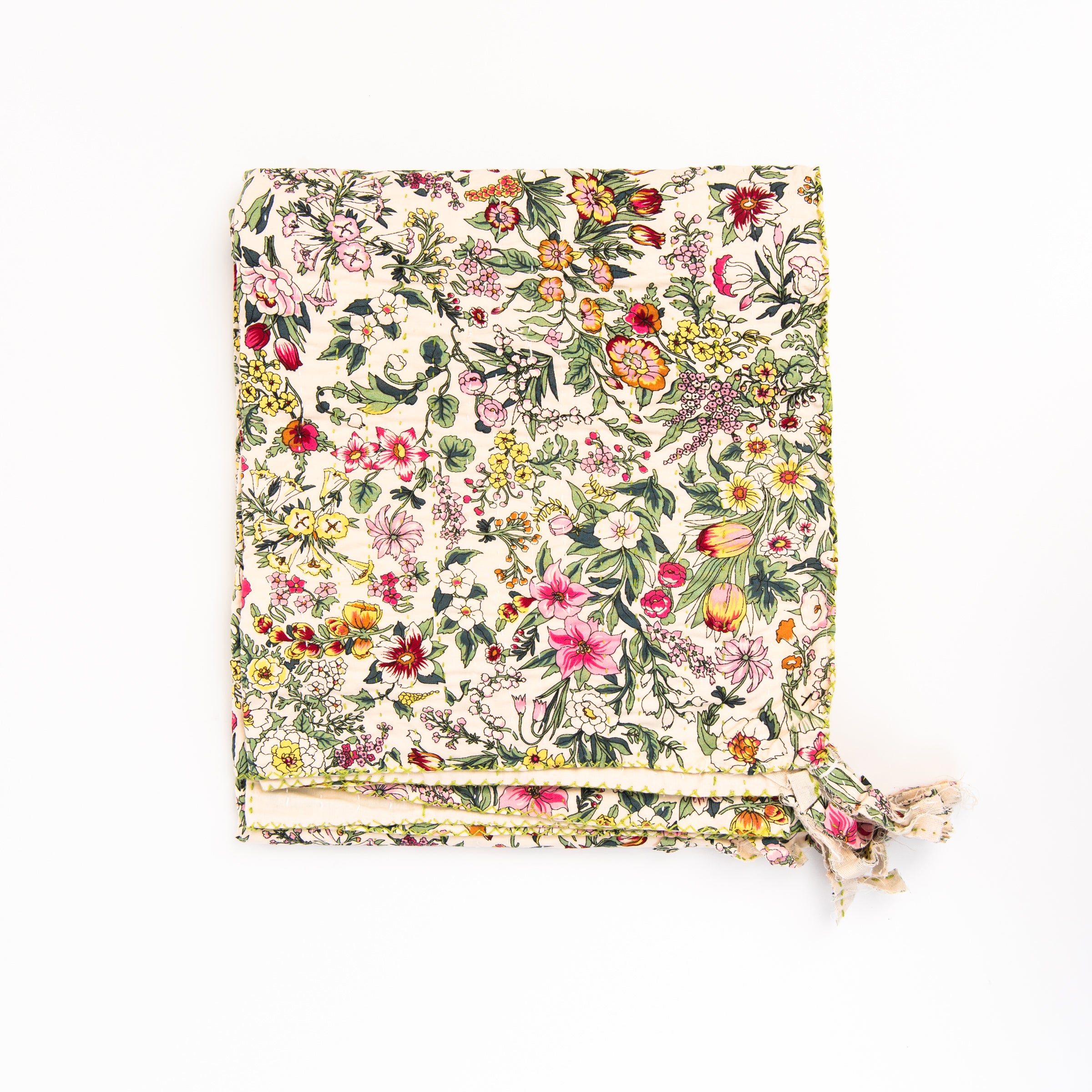 Secret Garden Quilted Throw Blanket on a white background at Addison West