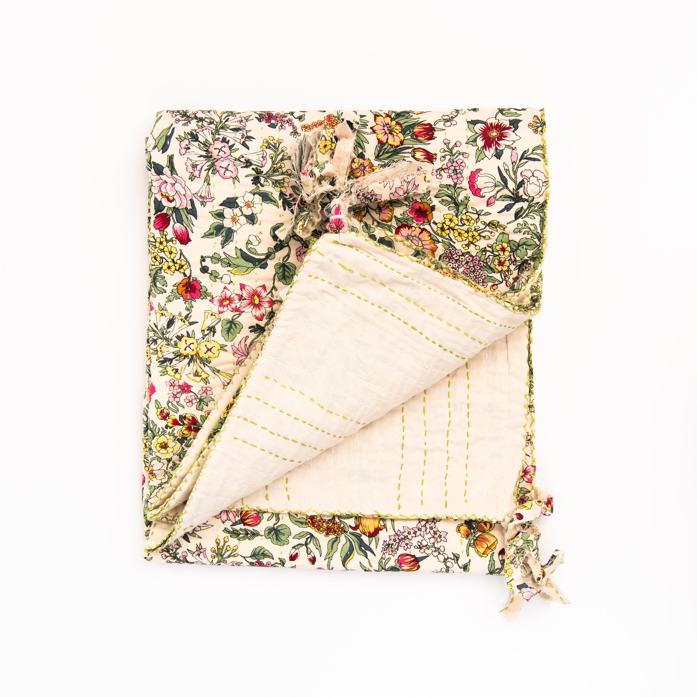 Secret Garden Quilted Throw Blanket on a white background at Addison West