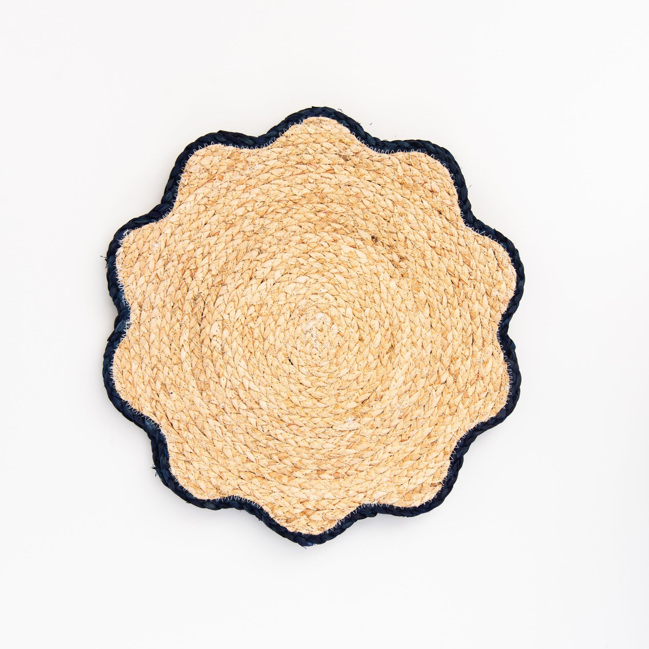 Handwoven Scalloped Edge Placemats on a white background at Addison West