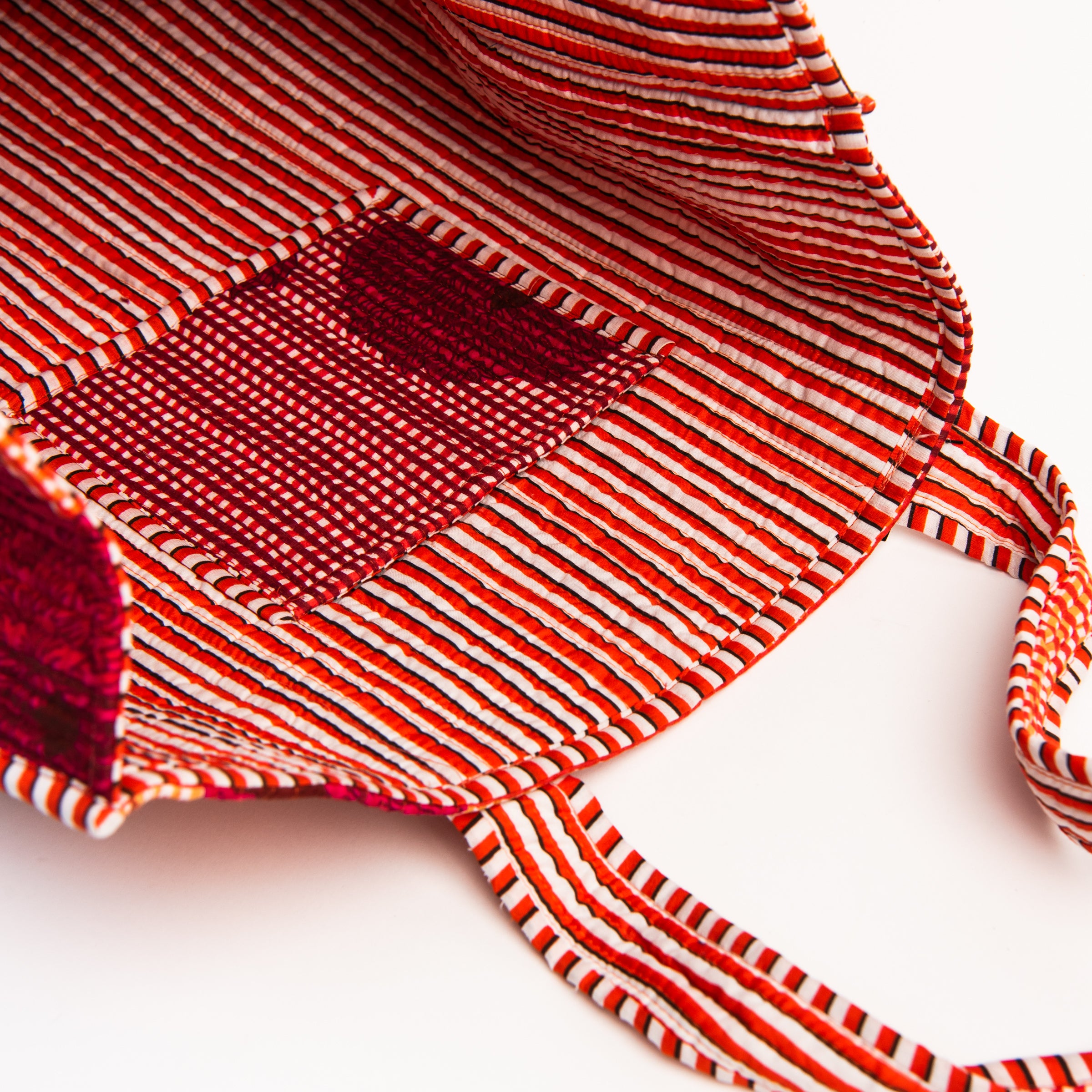 Close up of Hand Block Print Tote in Check on a white background at Addison West