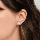 Elli Parr Mother of Pearl Heart Studs on a model at Addison West