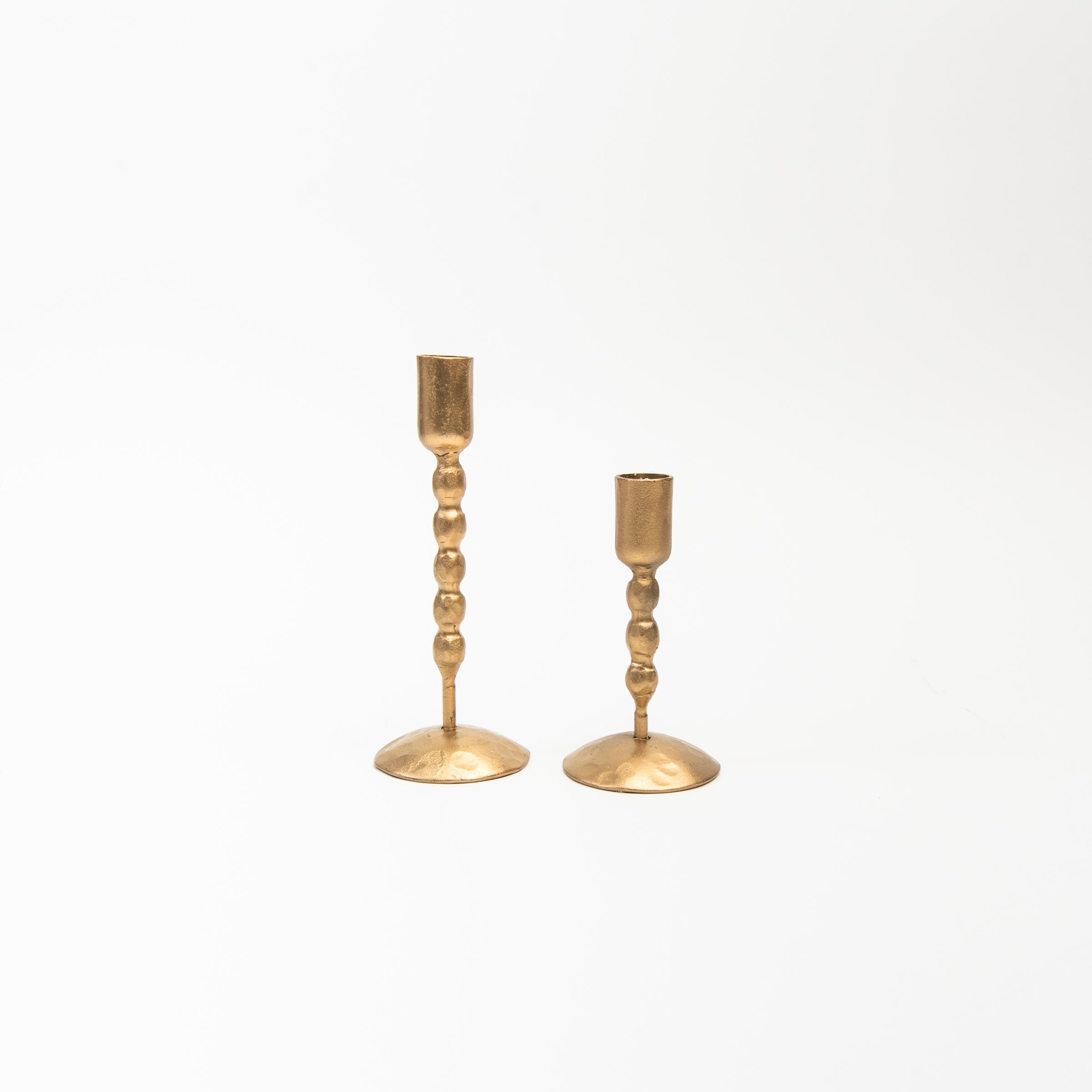 Marcella Taper Holders on a white background at Addison West