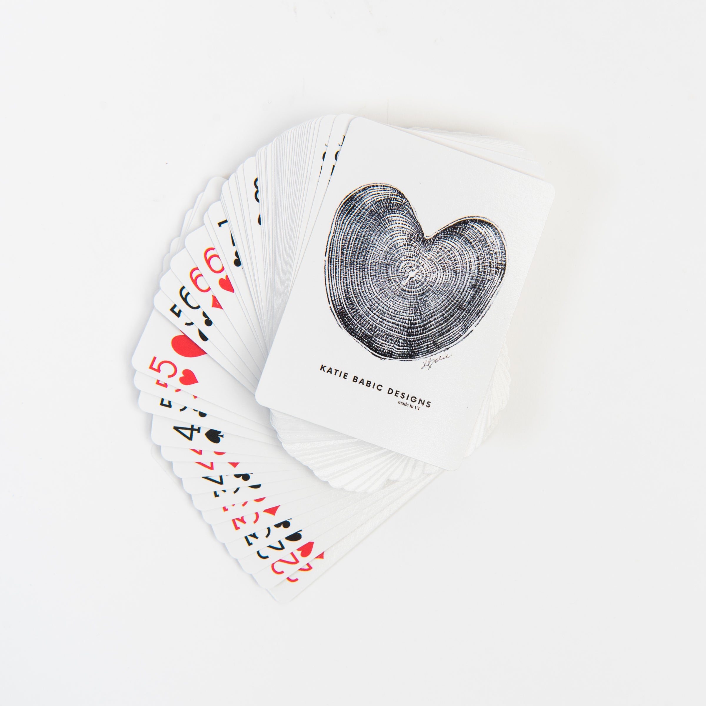 Katie Babic Heart Playing Cards on a white background at Addison West
