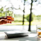 Simon Pearce Alpine Whiskeys, Set of 2 on a window sill at Addison West