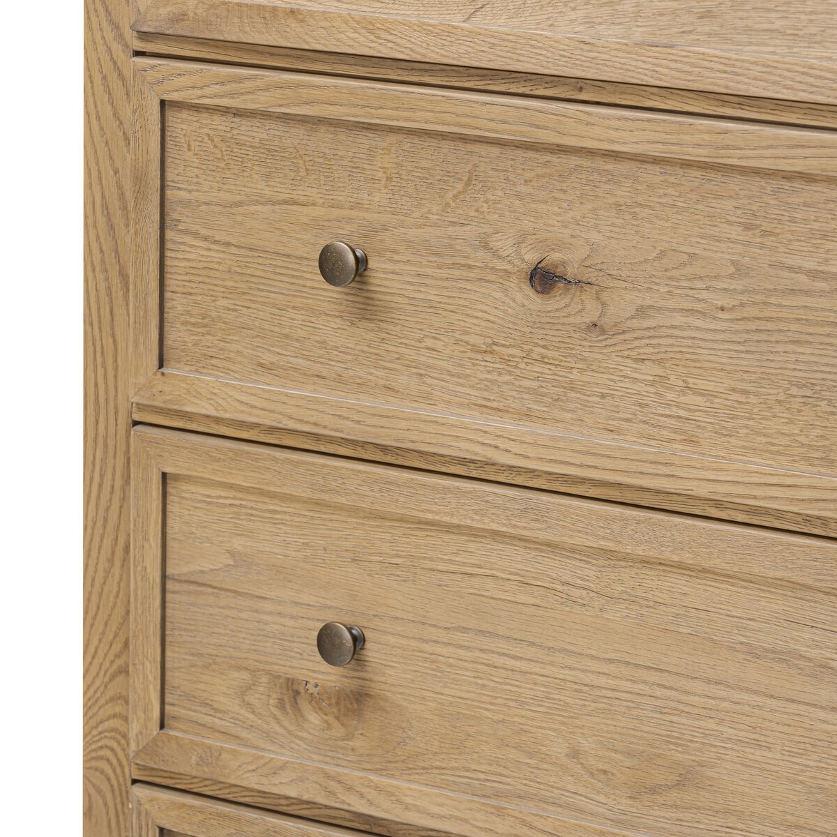 Close up of Amber Lewis x Four Hands Geoffrey Tall Dresser in Worn Oak Veneer on a white background at Addison West