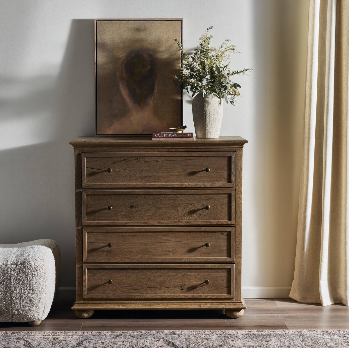 Amber Lewis x Four Hands Geoffrey Tall Dresser in Worn Oak Veneer in a neutral bedroom at Addison West