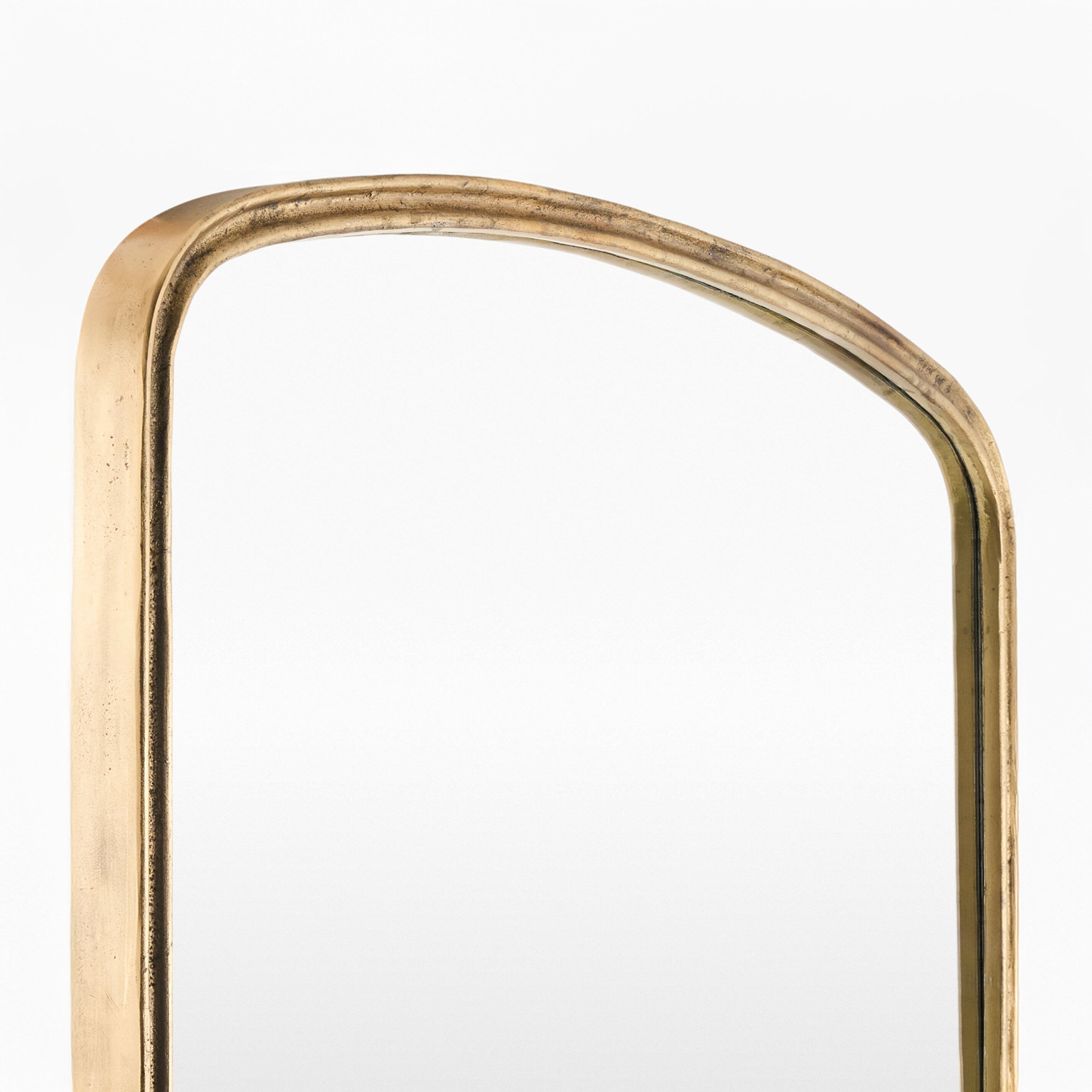 Close up of Anemoi Accent Mirror on a white background at Addison West