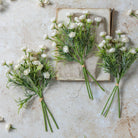 Abigail Ahern Faux Hellebore Bunch in White on a table at Addison West