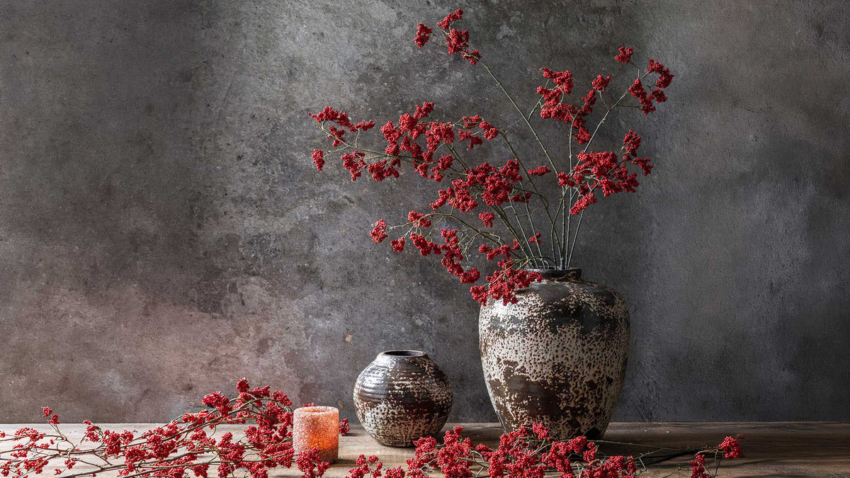 Abigail Ahern winterberry festive holiday faux florals on a grey background at Addison West