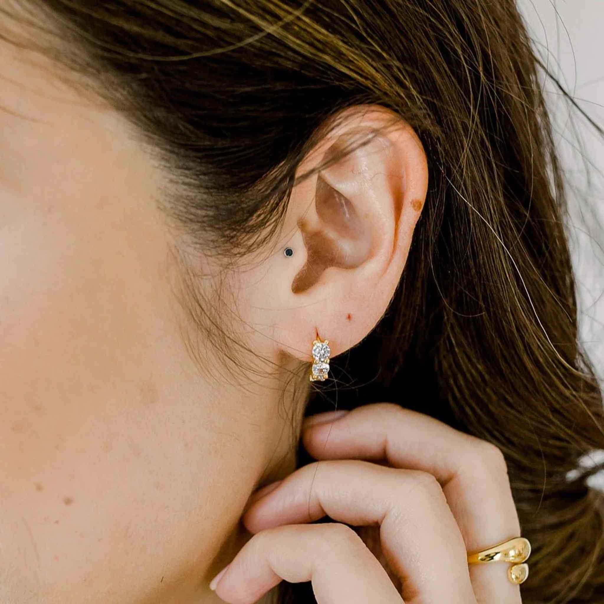 Elli Parr Asher Huggies in Gold on a model at Addison West