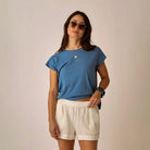 Astrid Hemp Tee in Captain shown on model on plain background.