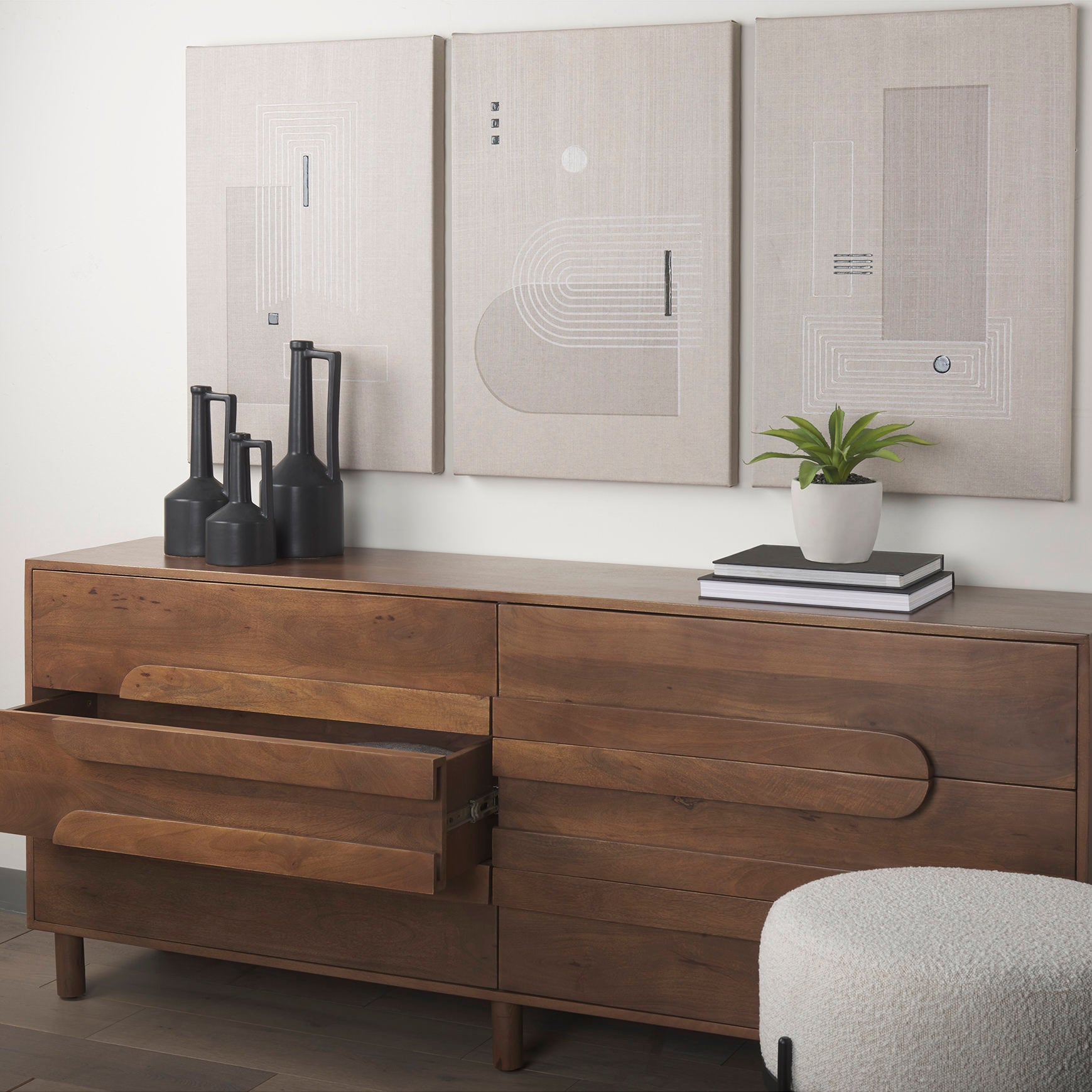 Astrid 71L x 17W x 30.3H Medium Brown Solid Wood 6 Drawer Sideboard in a modern living room
