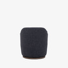 Four hands furniture brand Aurora swivel chair in Thames Slate on a white background