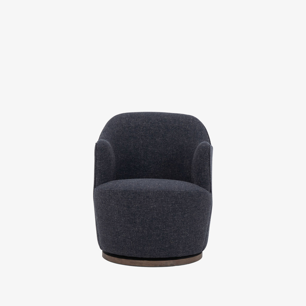 Four hands furniture brand Aurora swivel chair in Thames Slate on a white background
