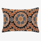 Azul Suzani Pillow on a white background with blue and rust stitching 