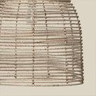 Close up of Beehive Chandelier on a beige background at Addison West