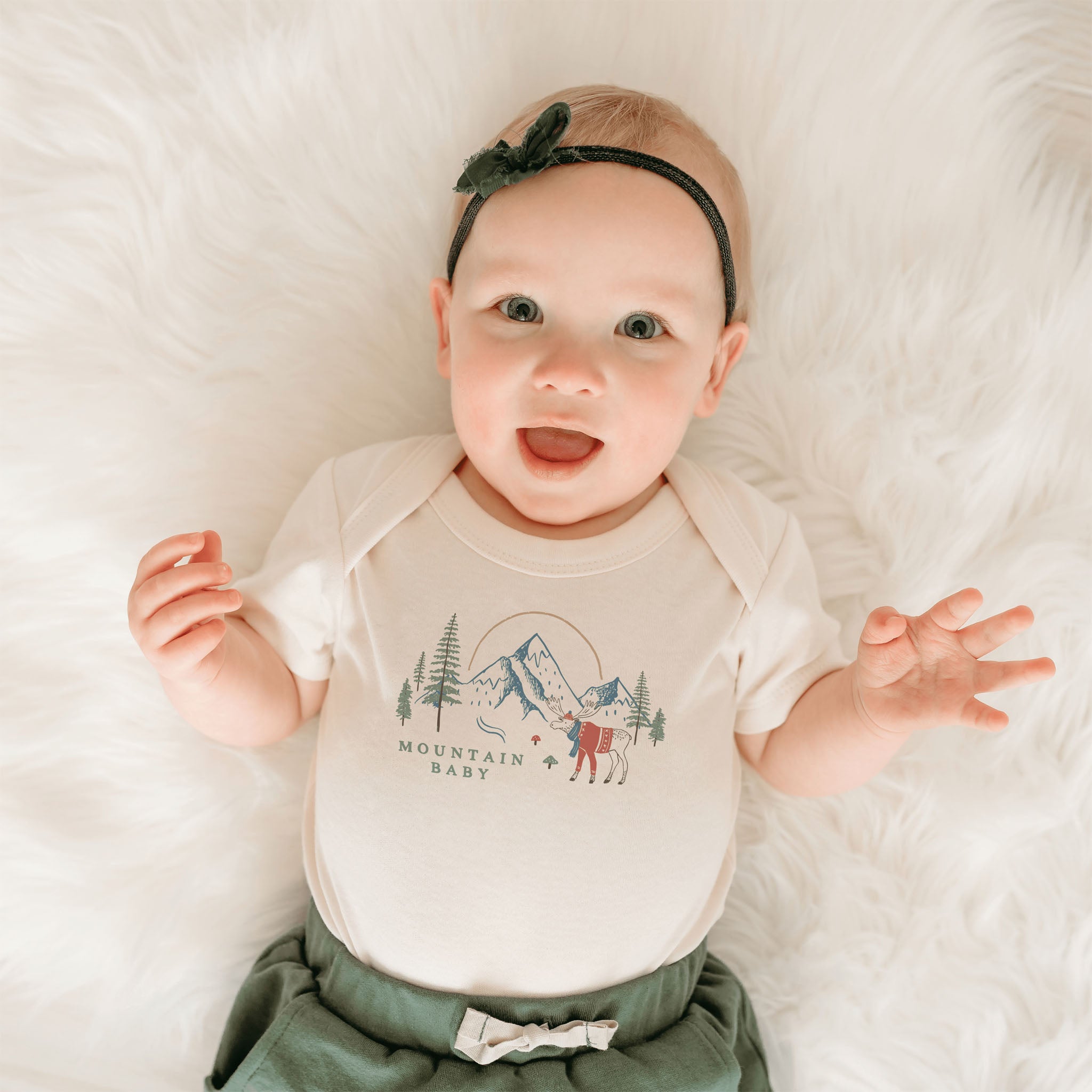 Mountain Baby Organic Cotton Babysuit on a white background at Addison West