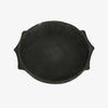 Rustic black Hand Carved Shallow Stone Bowl on a white background