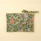 Block Print Pouch in Green on a beige background at Addison West