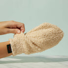 The Body Mitt on a green background at Addison West