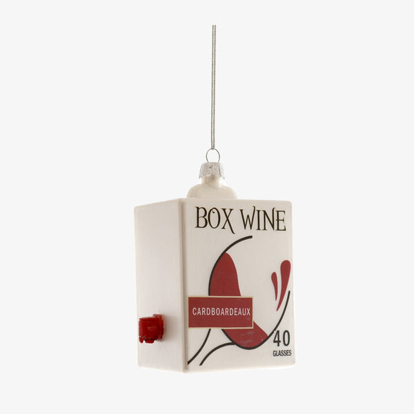 Box of red wine Christmas tree ornament by Cody Foster on white background