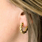 Elli Parr Braided Hoops on a model at Addison West