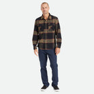 Male model wearing Brixton Men's Bowery Flannel in Heather Grey & Charcoal on plain background.