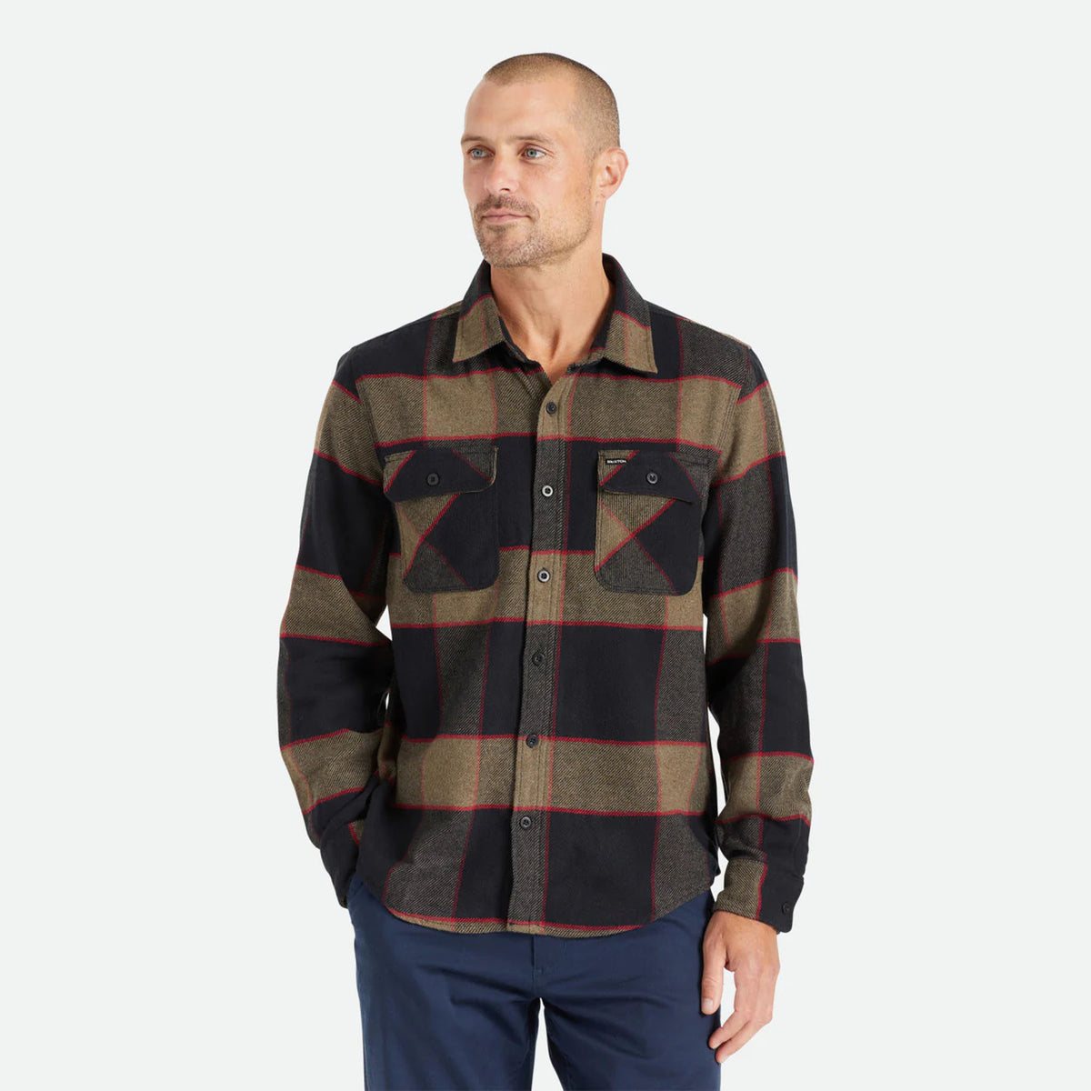 Male model wearing Brixton Men's Bowery Flannel in Heather Grey & Charcoal on plain background.