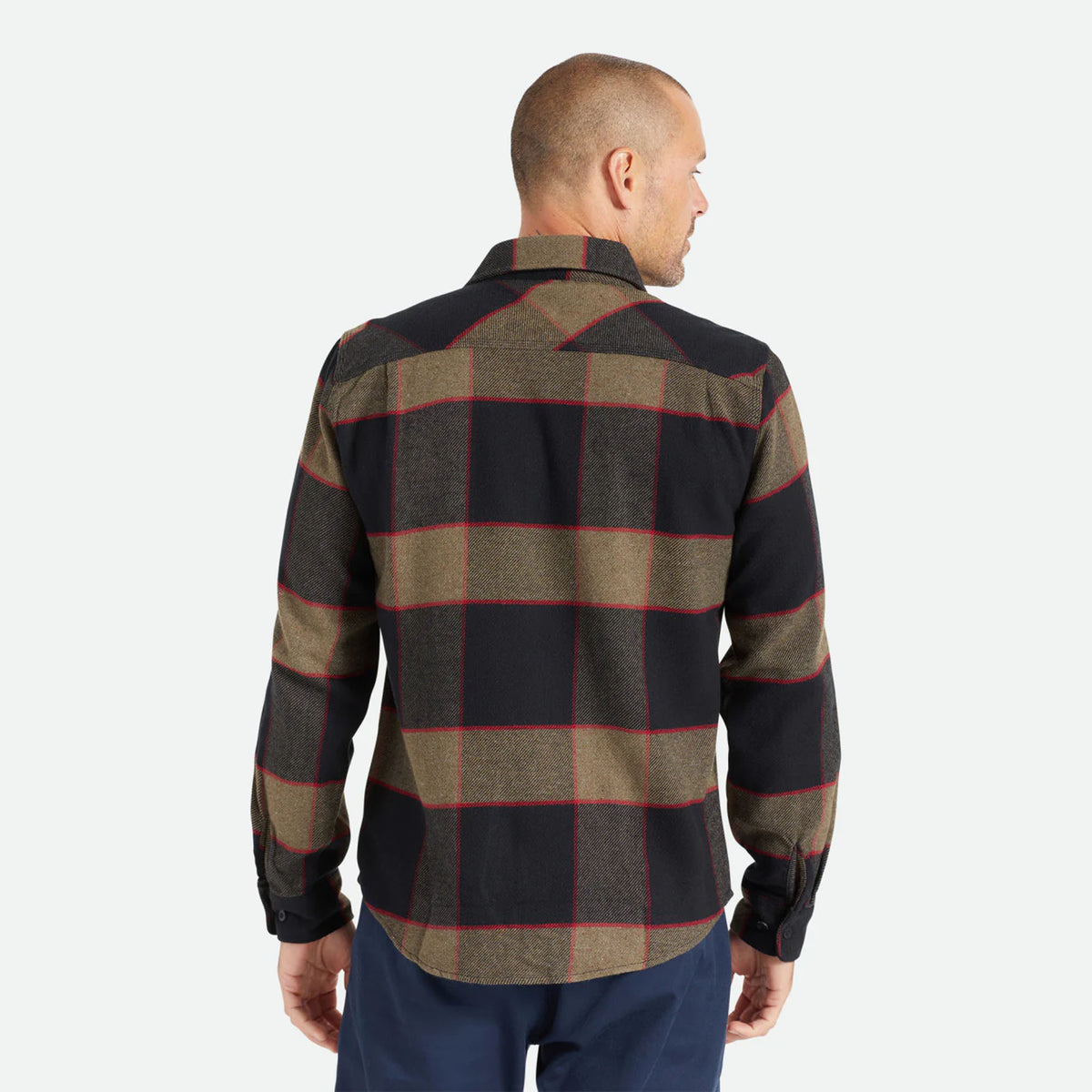 Male model wearing Brixton Men's Bowery Flannel in Heather Grey & Charcoal on plain background.