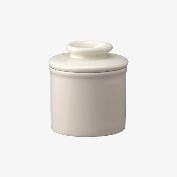 White ceramic butter keeper on a white background