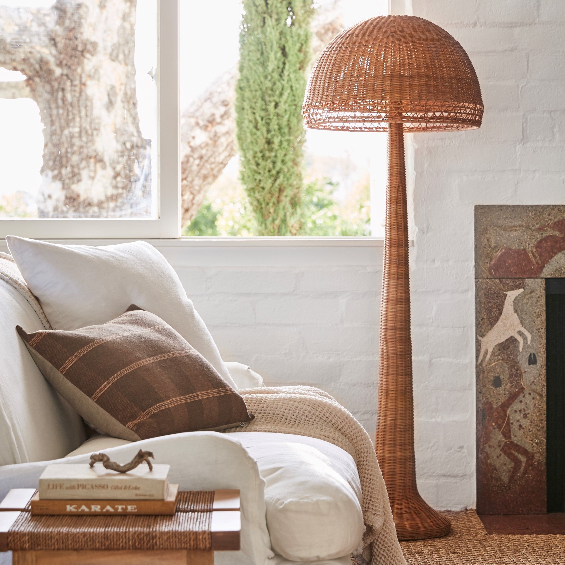 Woven Augusta Floor Lamp in a living room at Addison West