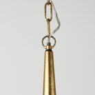 Close up of Capsa 17x29 Antique Gold and Silver Toned Metal Dome Pendant Light on a white background
