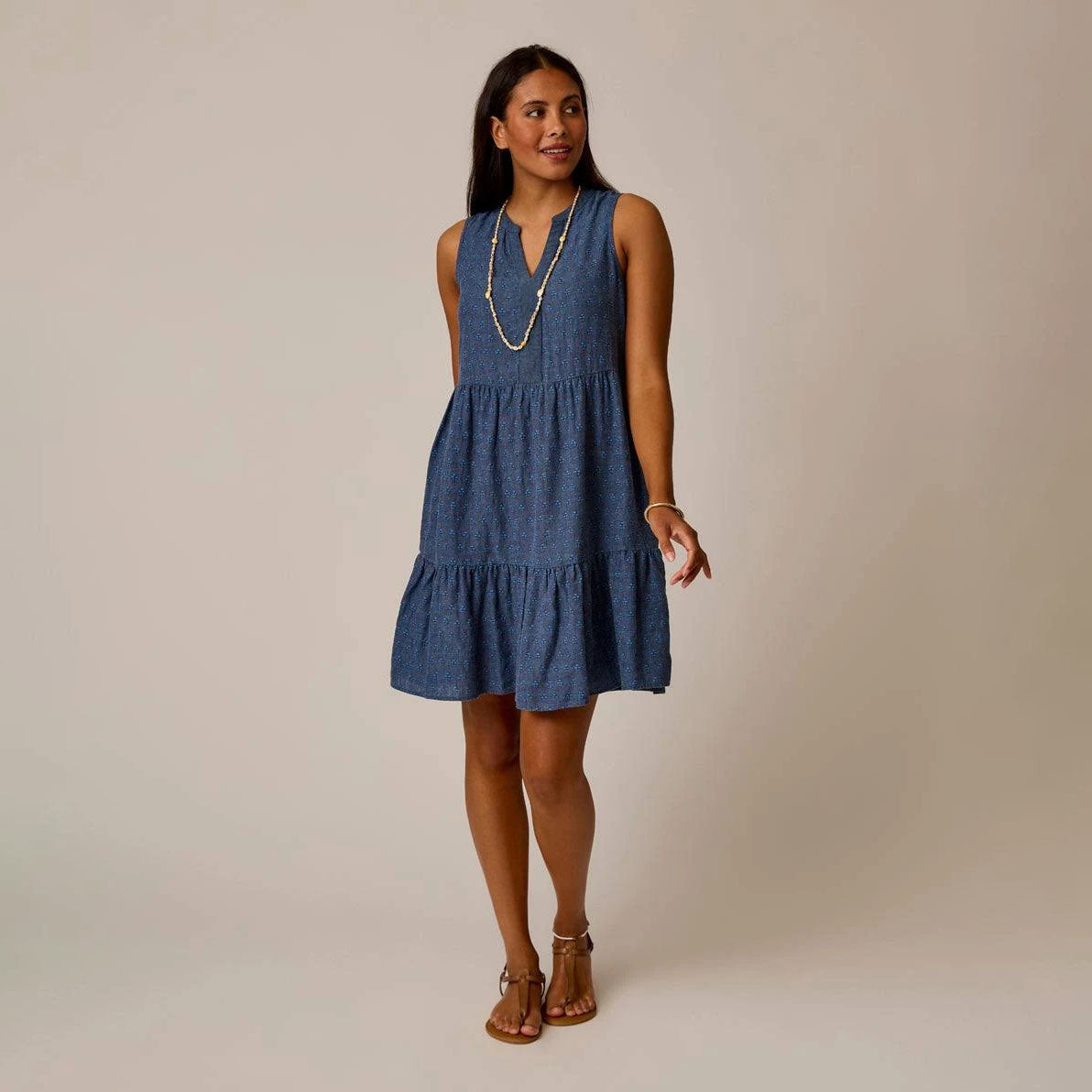Nellie Linen Dress in Tossed Batik shown on model on plain background.